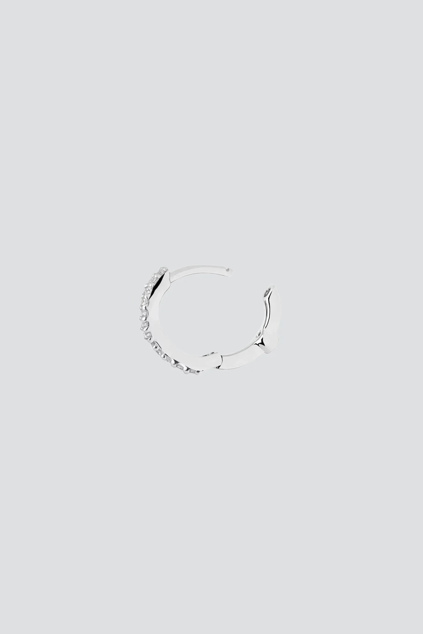 White Gold Wave Diamond Huggie - Image 4